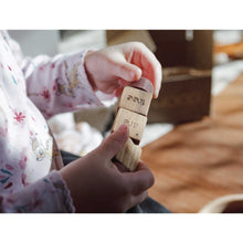 Load image into Gallery viewer, mindful spindle held by child displaying we are  free
